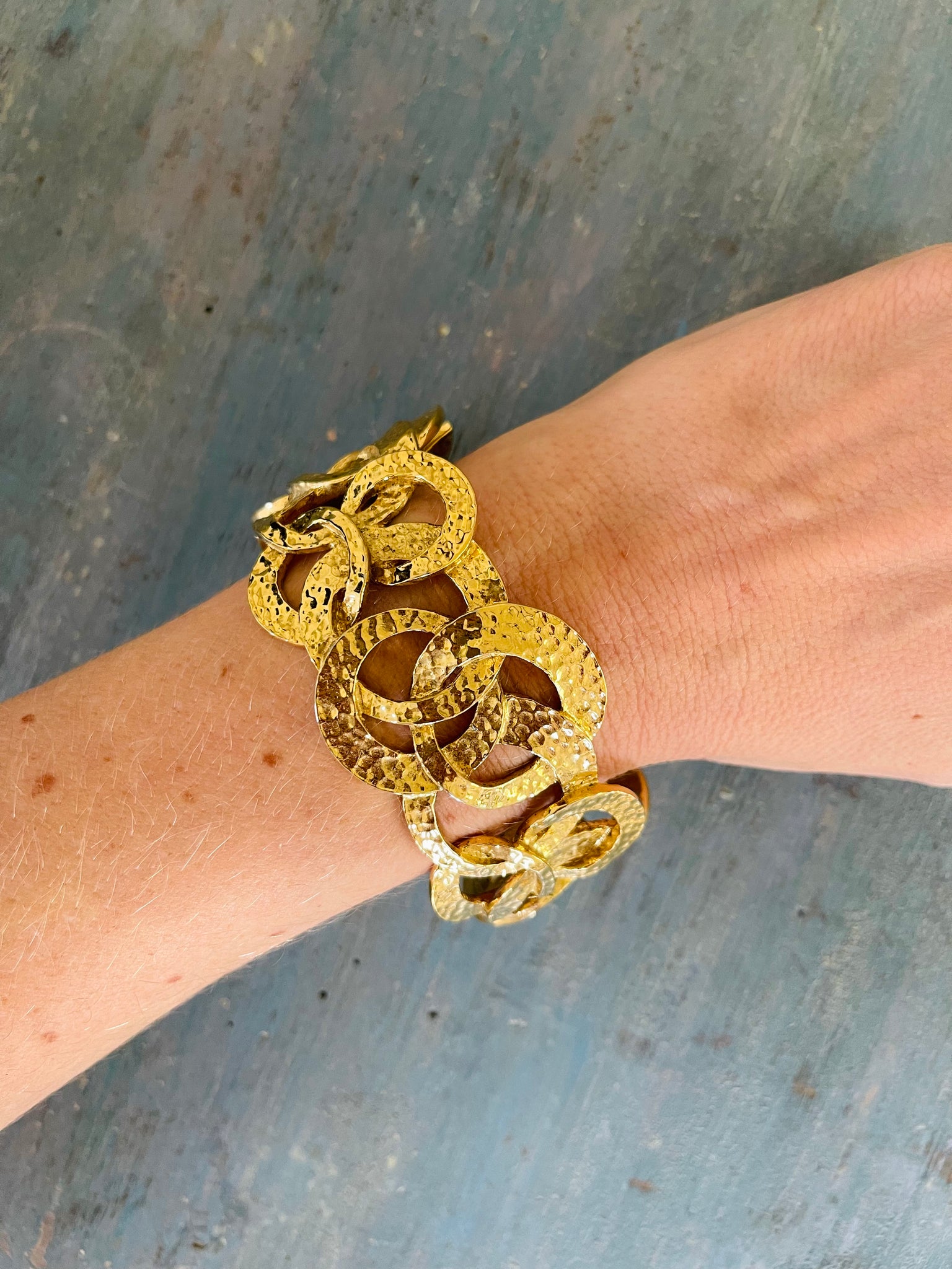 Wide Hammered Gold Bracelet With Interlocking Circles