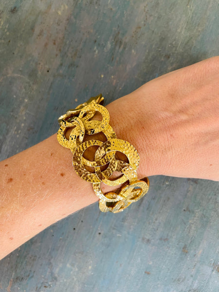 Wide Hammered Gold Bracelet With Interlocking Circles